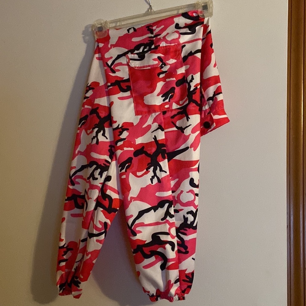 Pink, black, and white jogging pants